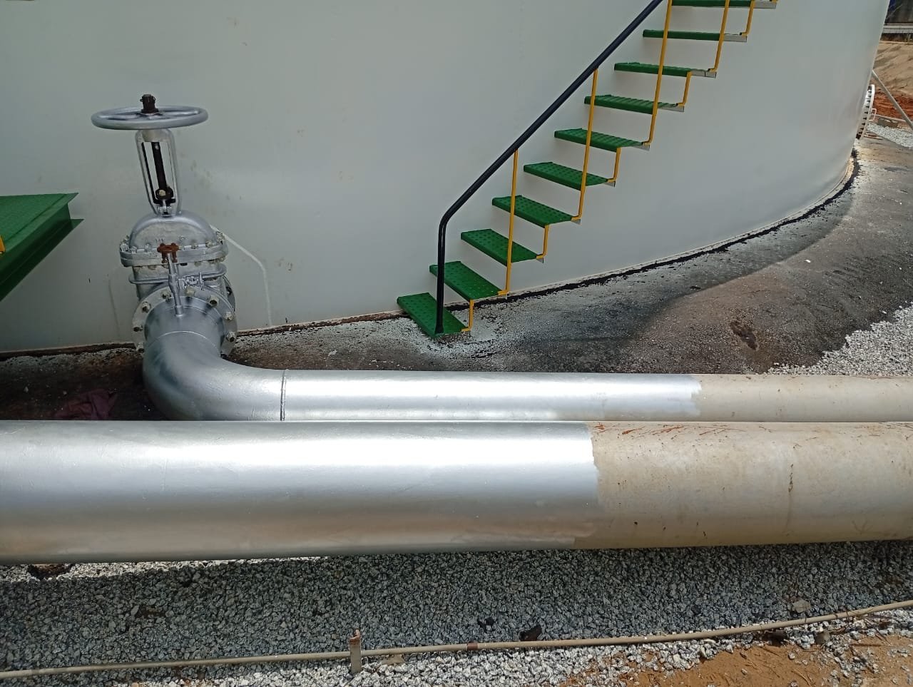 Blasting and painting of tank piping